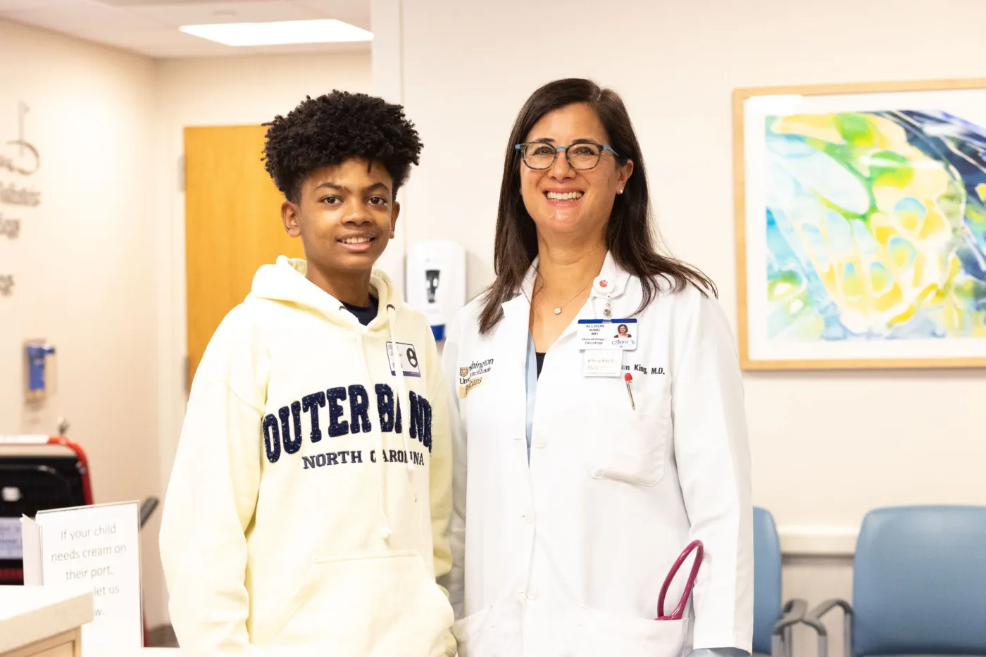 Xander with Dr. Allison King, Fred M. Saigh Distinguished Chair in Pediatric Research at teh Children's Discovery Institute